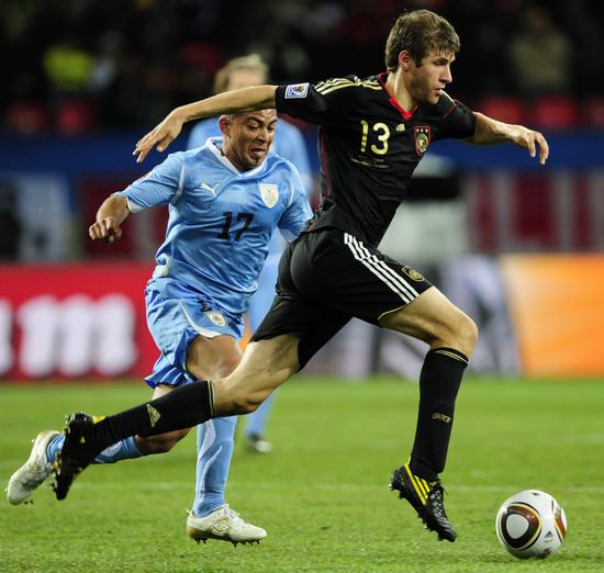 丹麦逆转乌拉圭，穆勒刷新纪录